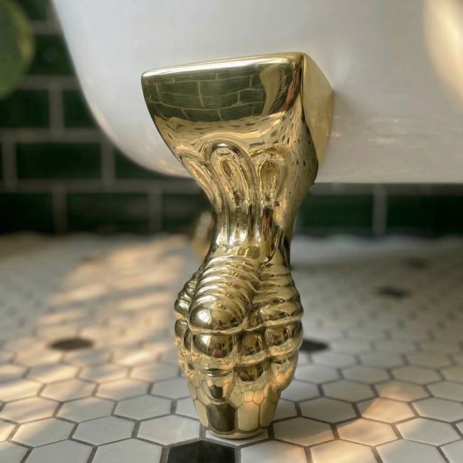Digital Illustration of the Solid Brass Square Ball and Claw Bath Feet Depicted on a White Bath in a Tiled Bathroom Digital Illustration of the Solid Brass Square Ball and Claw Bath Feet Depicted on a White Bath in a Tiled Bathroom
