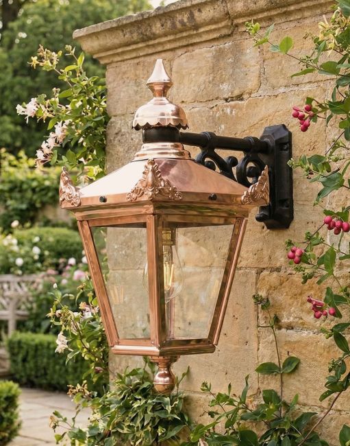 Digital Illustration of the Standard Size 61 x 46cm Copper Hanging Wall Lantern. Mounted on a Rustic Garden Wall