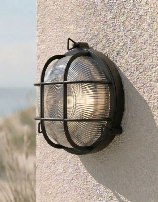 Digital Illustration of the Traditional Nautical Round "Danby" Bulkhead Wall Light in a Black Finish Mounted on a Cream Coloured Exterior Wall