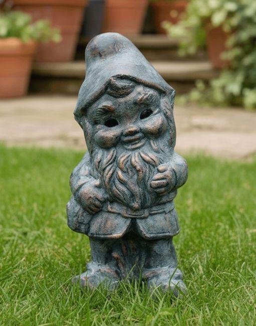 Digital Illustration of the Verdigris Finished "Hodge’ the Garden Gnome in Cast Aluminium Placed in Front of Flower Pots