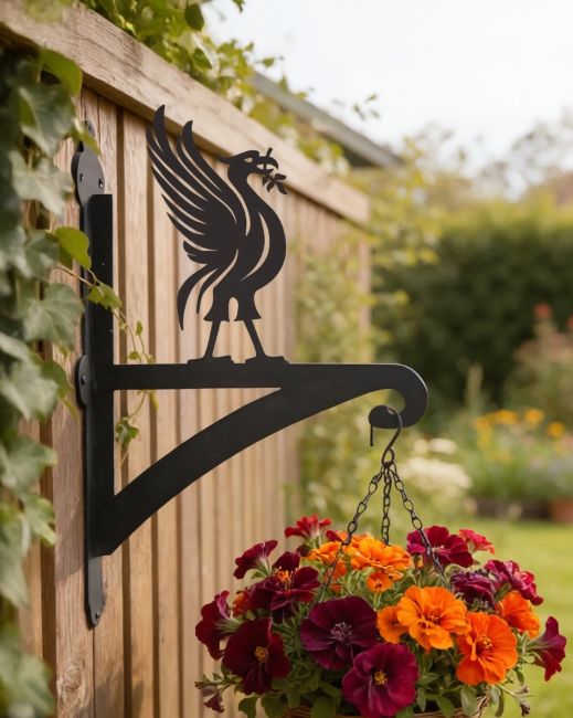 Digital representation of Liver Bird Iron Hanging Basket Bracket mounted on a fence
