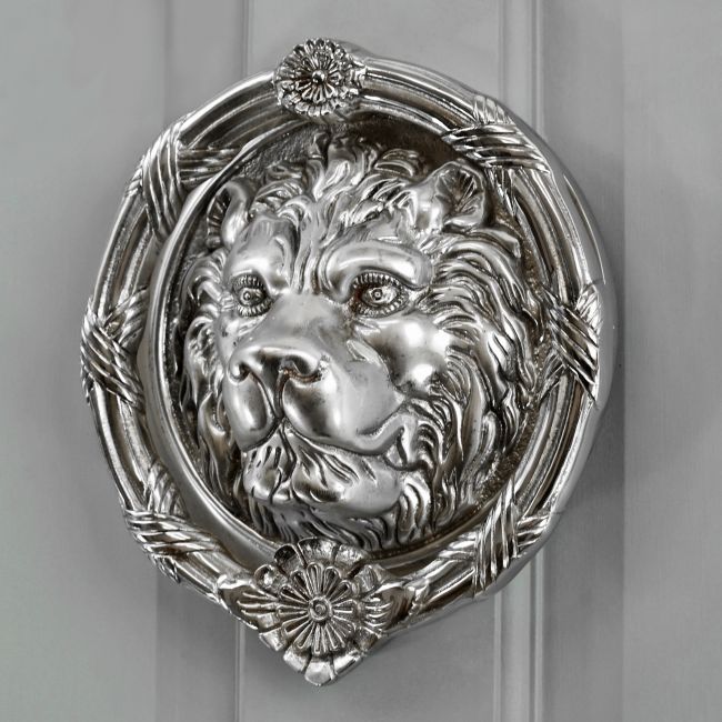 Bright Chrome Sandringham door knocker on grey door
