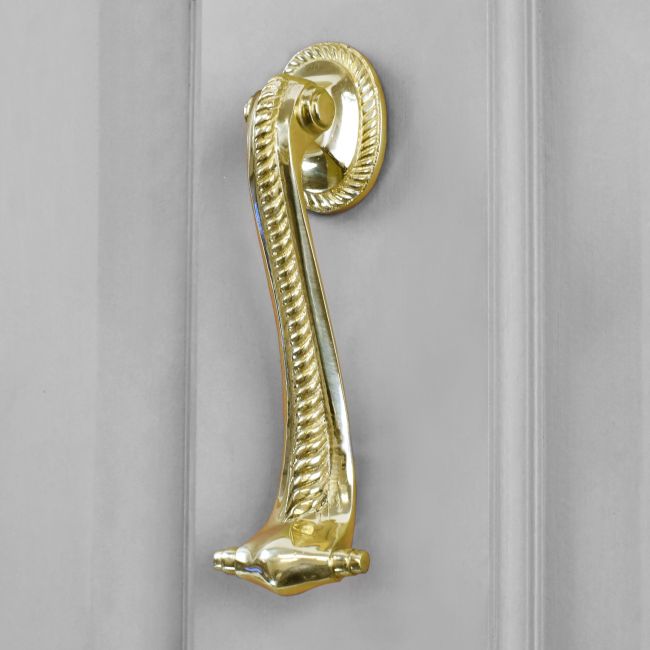 Polished Brass Georgian style door knocker on Grey door Polished Brass Georgian style door knocker on Grey door