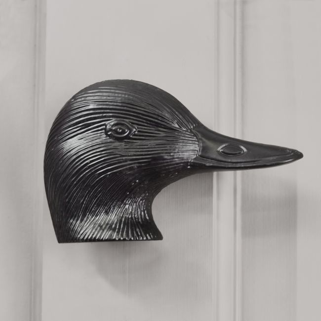 Black Duck door knocker on grey door Black Duck door knocker on grey door