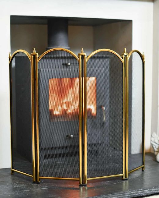 Dynasty Four Fold Fire Screen in Polished Brass in Situ Dynasty Four Fold Fire Screen in Polished Brass in Situ