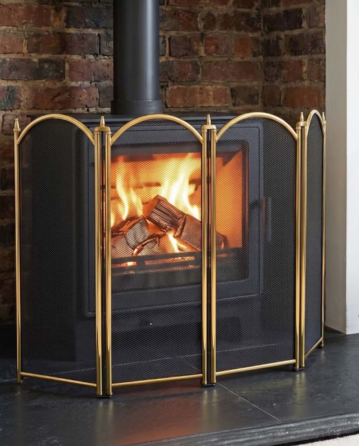 Dynasty Four Fold Fire Screen in Polished Brass in Situ Dynasty Four Fold Fire Screen in Polished Brass in Situ