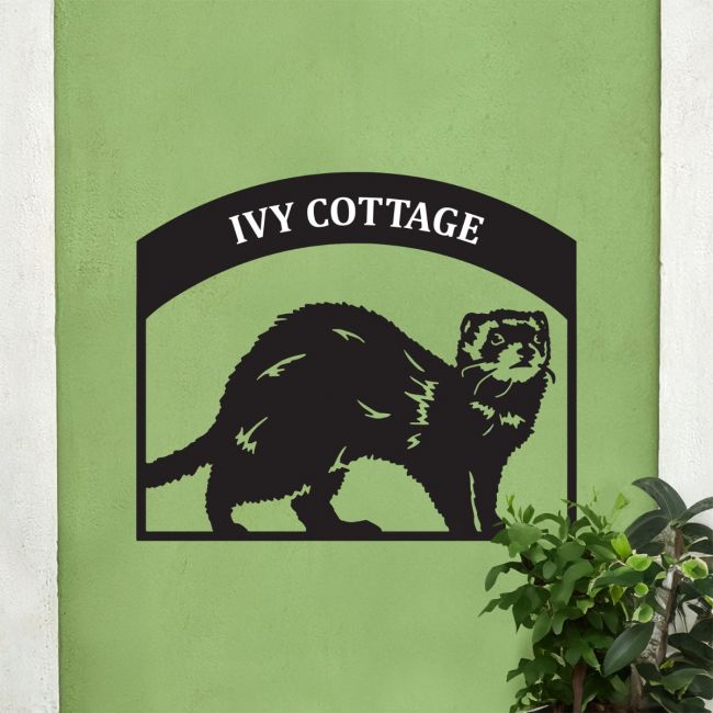Steel Ferret House Name Sign On Green Wall 