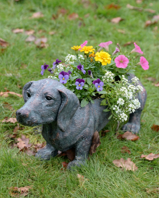 "Digby" the Sausage Dog Cast Aluminium Planter - Verdigris with flowers coming out the top