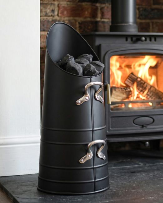 The Traditional "Norfolk" Coal Hod with Nickel Handles in a Modern Living Room with a Fireplace - Digital Illustration