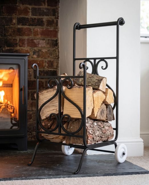 The Viking Wrought iron Log Trolley with Split Logs next to a Log Burner Stove - Digital Illustration The Viking Wrought iron Log Trolley with Split Logs next to a Log Burner Stove - Digital Illustration