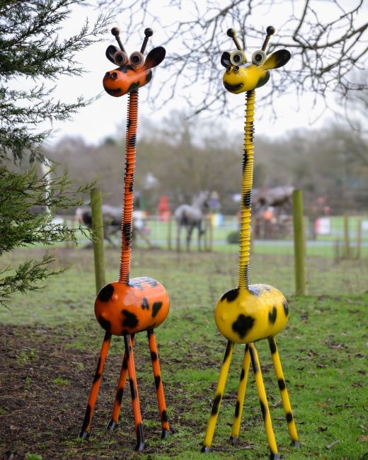 ‘Stretch’ Upcycled Gas Bottle Giraffe Garden Sculpture - Yellow with companion orange giraffe