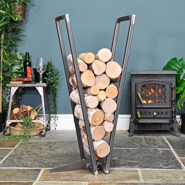 Iron V Shaped Log Holder in Situ by the Fire Iron V Shaped Log Holder in Situ by the Fire