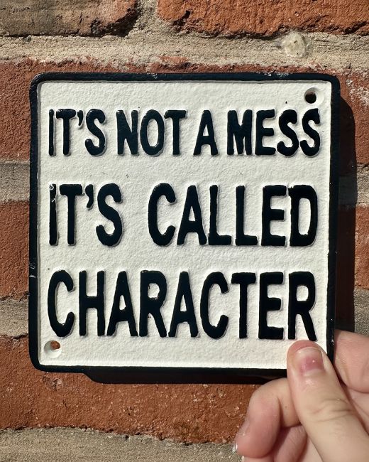Cast Iron "It"s Called Character" Sign Cast Iron "It"s Called Character" Sign