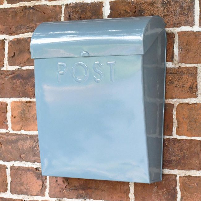 Simplistic mail box mounted on wall Simplistic mail box mounted on wall