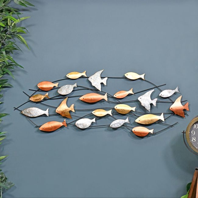 Metallic Swimming Fish Wall Art in Situ on a Blue Wall Metallic Swimming Fish Wall Art in Situ on a Blue Wall