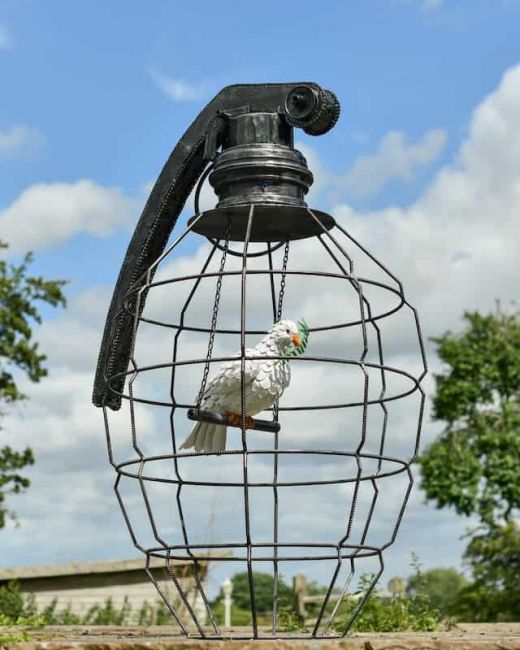 Recycled Metal "Peace Confined" Sculpture Recycled Metal "Peace Confined" Sculpture