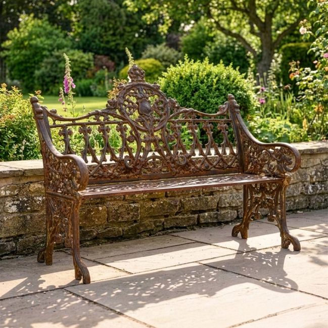 Rustic Cast Iron Gothic Two Seat Bench in Use in the Garden