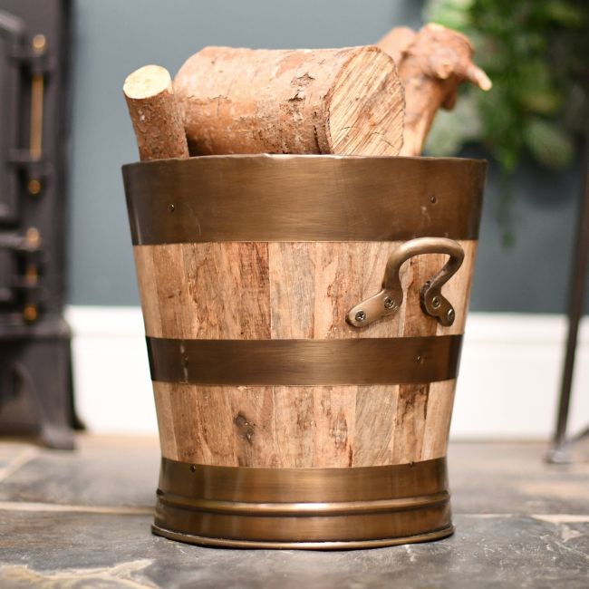 Wooden & Bronze Barrel Design Log Holder in Situ Wooden & Bronze Barrel Design Log Holder in Situ