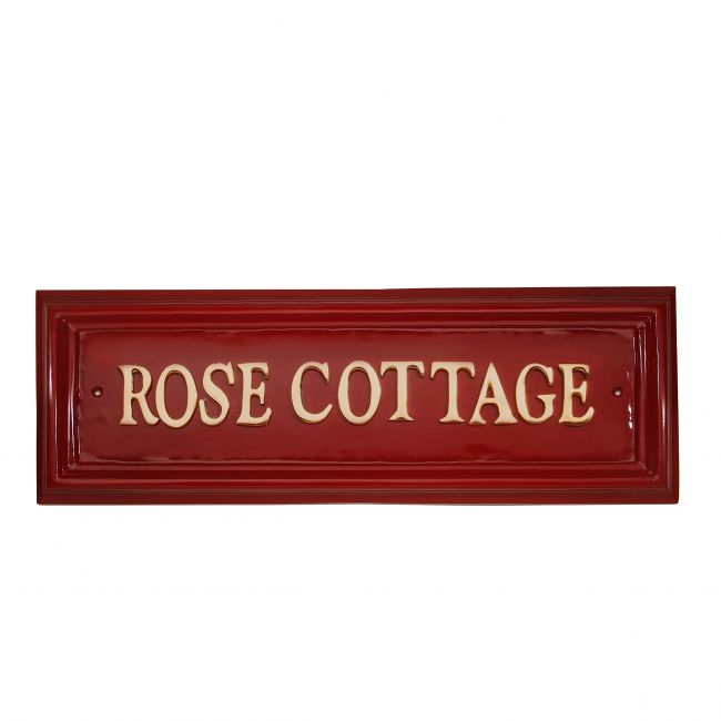 Red Rectangular house name sign with Brass letters Red Rectangular house name sign with Brass letters