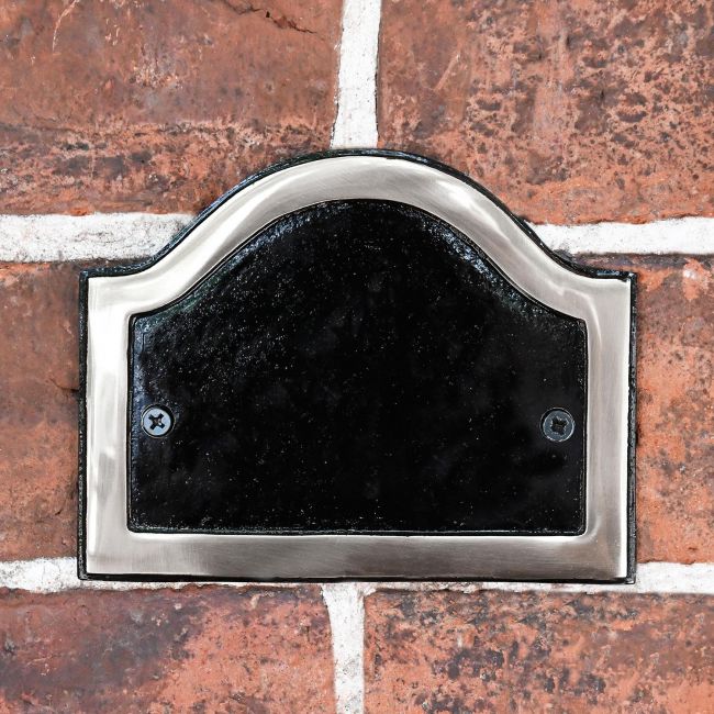 Black with Chrome Blank Arched House Number Plaque on a Brick Wall Black with Chrome Blank Arched House Number Plaque on a Brick Wall
