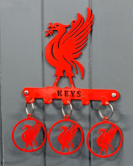 Steel Liver Bird with Set of Three Keyrings Steel Liver Bird with Set of Three Keyrings
