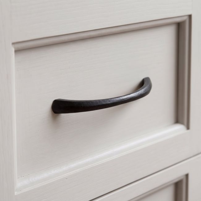 The 5" Curved Shell Pull Handle in Beeswax Shown Upright on a White Background