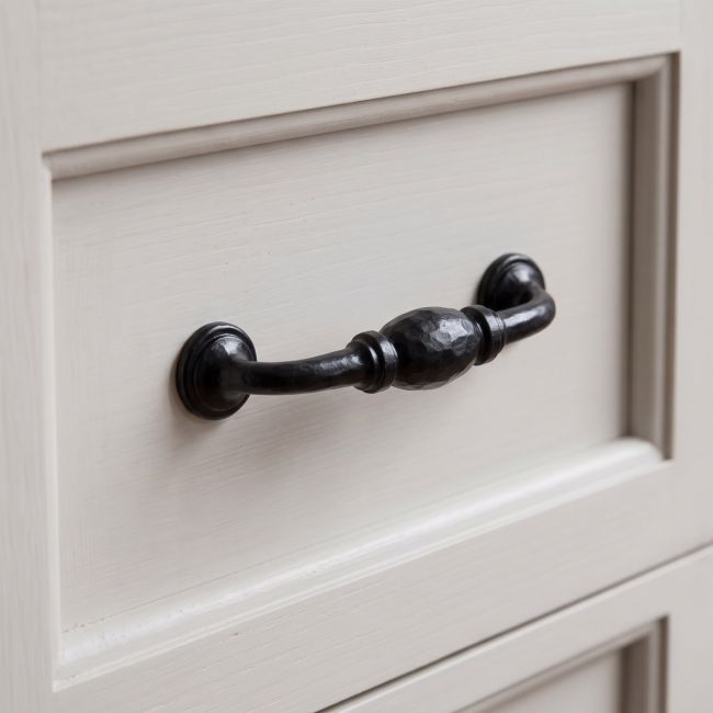 The 5" Hand-Hammered D Pull Handle in Black Shown Upright on a White Background
