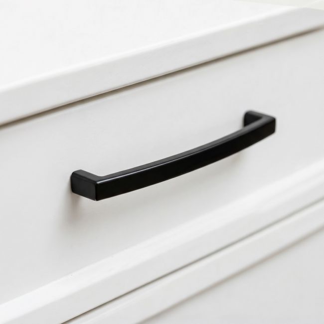 The 8.25" Linear Bridge Pull Handle in Black Stood Upright on a White Background