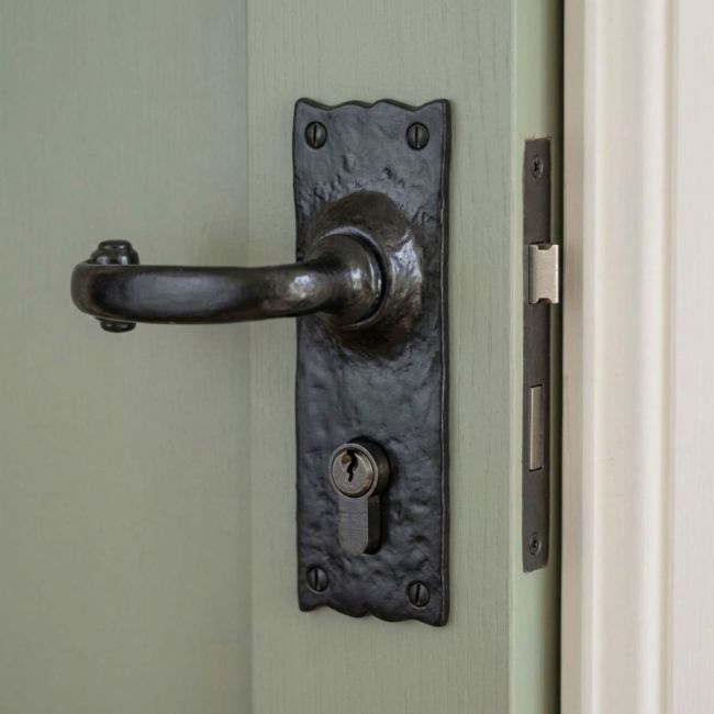 Euro Cylinder Handles - Rustic Lever Pair on a White Background 