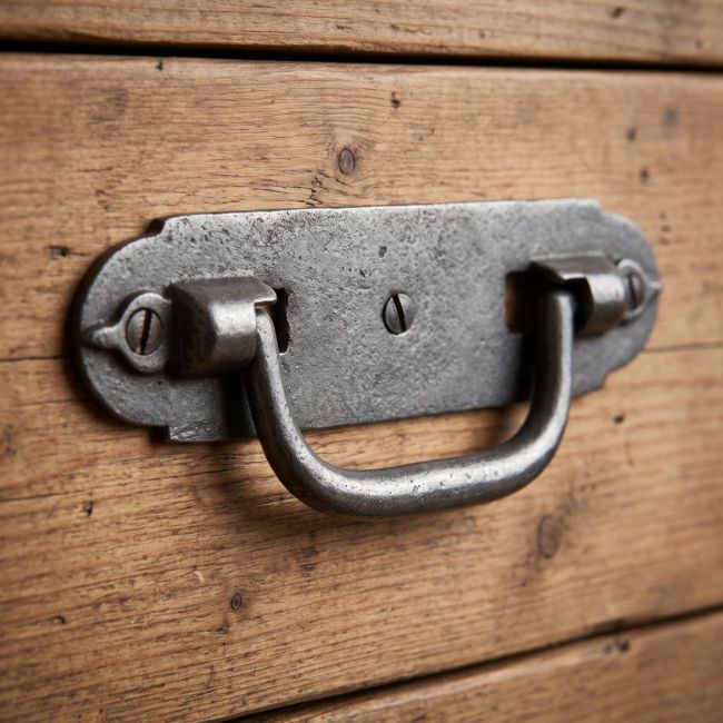 The Cotswold Backplate Drop Handle shown on a Green Set of Drawers - Digital Illustration