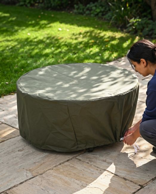 The Kadai Bowl Fabric Rain Cover for 90cm Bowls With a Lady Shown using the Drawstring Cord - Digital Illustration