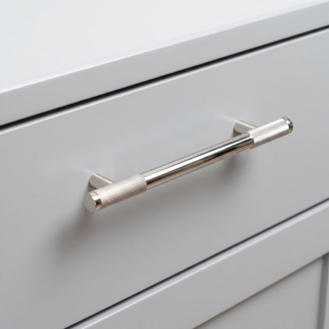 The Medium Half Knurled Cabinet Pull Handle in Polished Nickel Shown Upright on a White Background