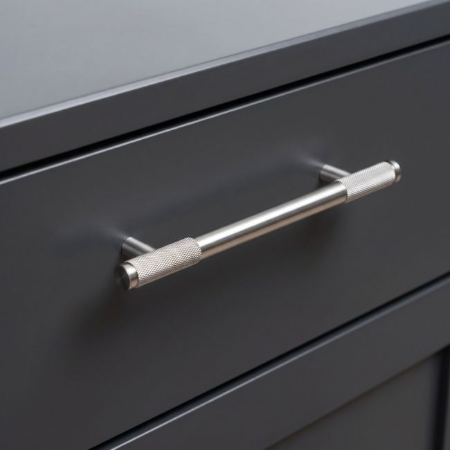The Medium Half Knurled Cabinet Pull Handle in Satin Stainless Steel Shown Upright on a White Background