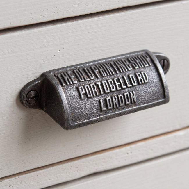 The Portobello Antique Iron Cup Pull Handle 98mm Shown on a Set of Grey Drawers - Digital Illustration