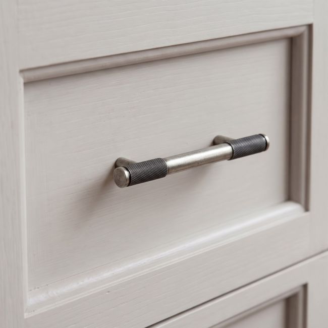 The Small Half Knurled Cabinet Pull Handle in Pewter Shown Upright on a White Background