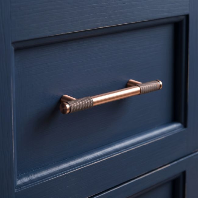 The Small Half Knurled Cabinet Pull Handle in Polished Bronze Shown Upright on a White Background