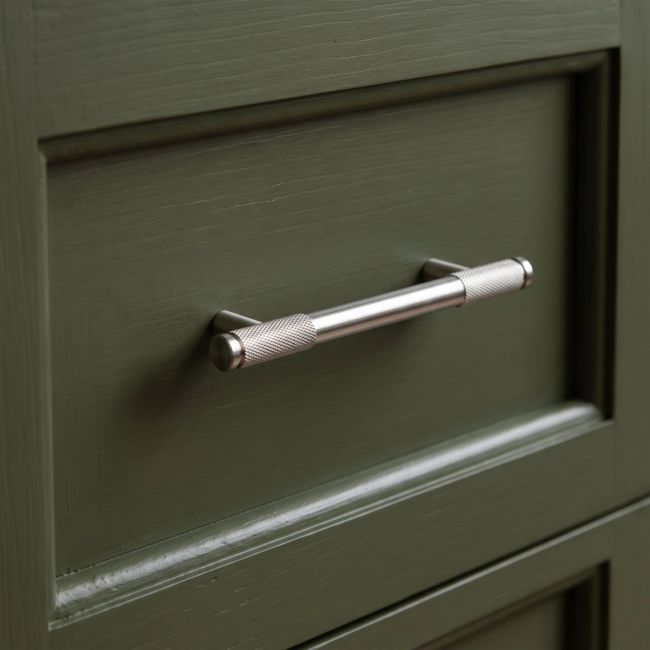 The Small Half Knurled Cabinet Pull Handle in Polished Stainless Steel Shown Upright on a White Background