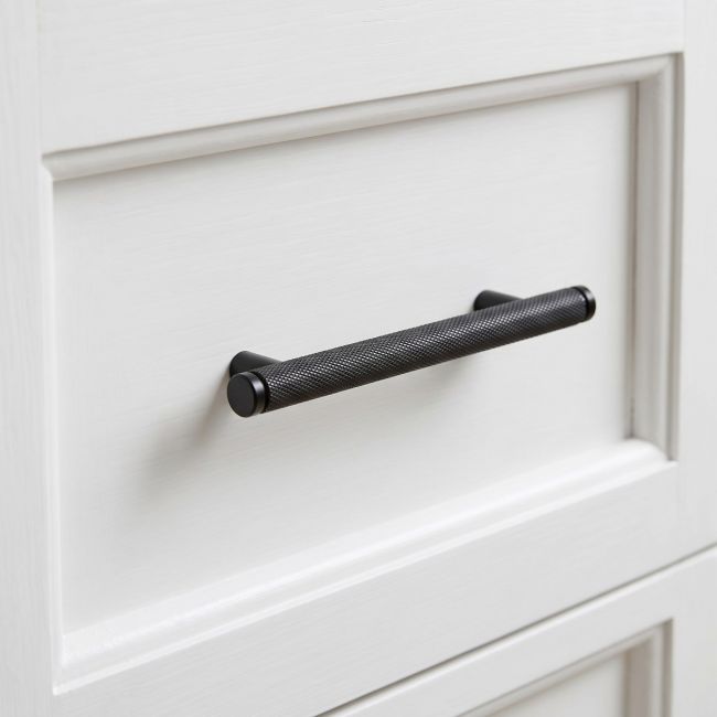 The Small Knurled Cabinet Pull Handle in Matt Black Shown Upright on a White Background