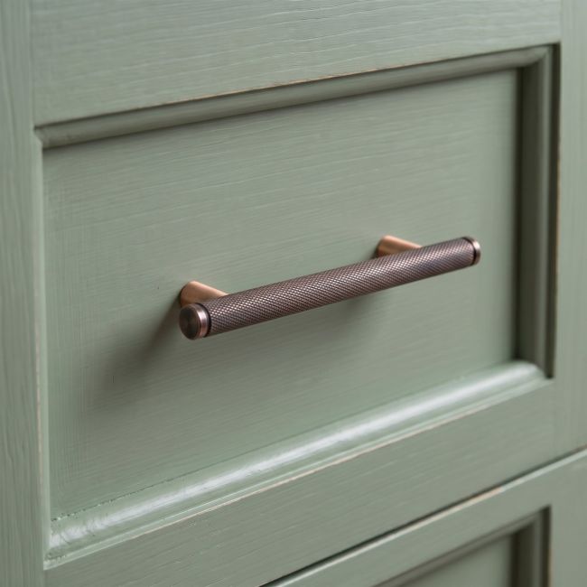 The Small Knurled Cabinet Pull Handle in Polished Bronze Shown Upright on a White Background