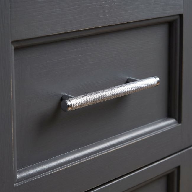 The Small Knurled Cabinet Pull Handle in Polished Chrome Shown Upright on a White Background