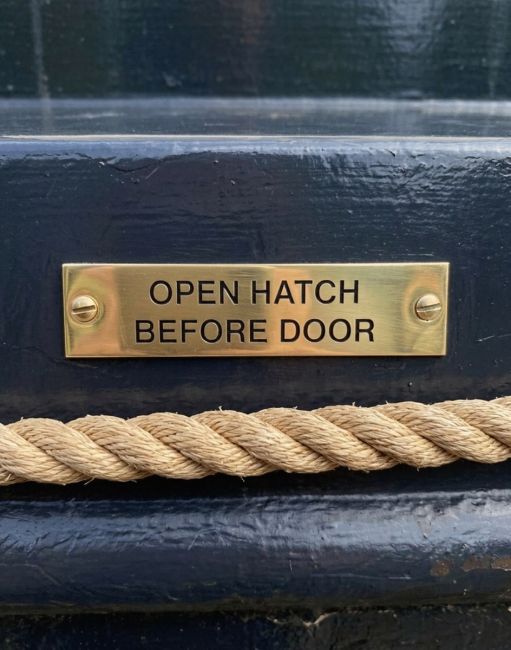 Solid Brass Plaque With Black Lettering Label "Open Hatch Before Door"