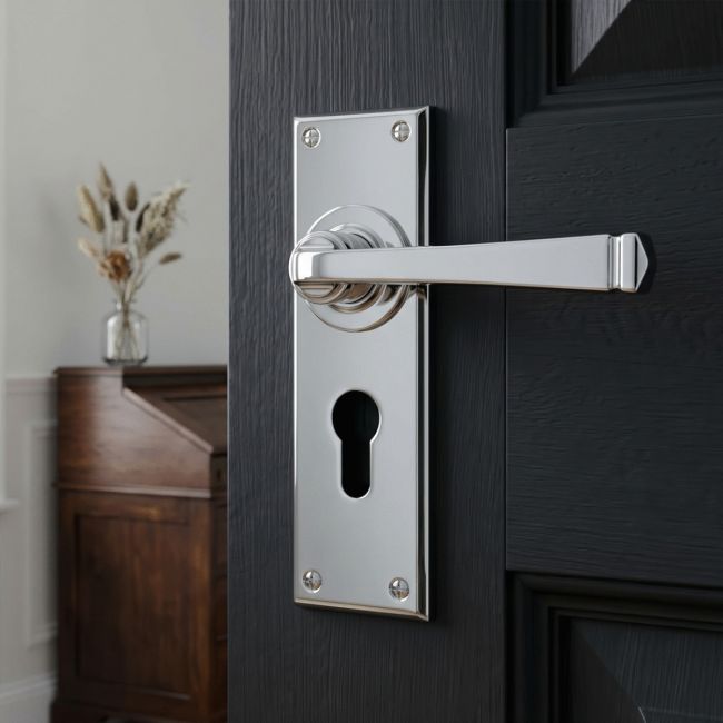 The Valen Lever Euro Lock Door Handle Set in Polished Stainless Steel Shown from the Front on a White Background