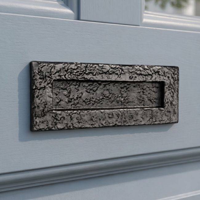 The 13" Traditional Black Iron Simplistic Door Letter Plate on a Light Blue Coloured Door on the Front of a Home - Digital Illustration