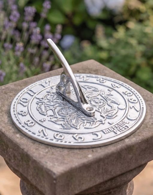 The 140mm Bright Chrome "Morning Glory" on Top of a Square Stone Garden Pillar The 140mm Bright Chrome "Morning Glory" on Top of a Square Stone Garden Pillar