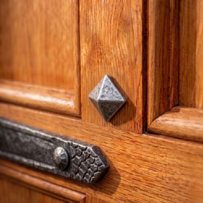 The 15mm Pewter Pyramid Door Stud Nailed into an Old Wooden Door on an Old Property - Digital Illustration 