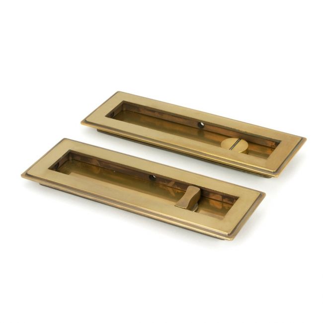 The 175mm Art Deco Rectangular Sliding Pocket Door Privacy Set in Aged Brass Showing the Front and Back Section from an Angle