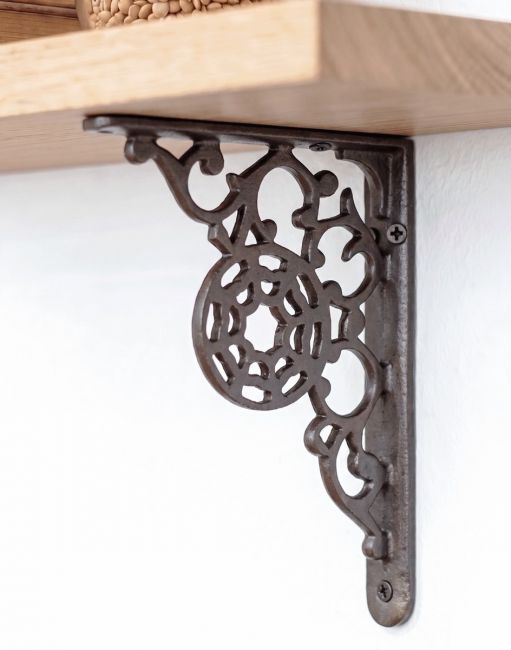 The 17 x 13cm "Harrison" Iron Shelf Bracket being used on a DIY Shelf in an Interior Modern Home - Digital Illustration 