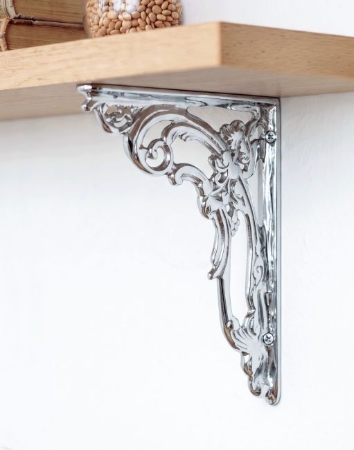 The 18 x 14cm "Victorian Amalina" Bright Chrome Ornate Scroll Bracket Used on a Wooden DIY Shelf in a Modern Home - Digital Illustration 