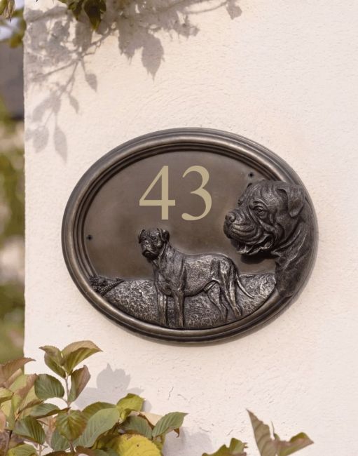 A Number 40 "Bentley" Bull Mastiff Dog House Sign Mounted on a Cream Coloured Sunny Cottage Wall - Digital Illustration A Number 40 "Bentley" Bull Mastiff Dog House Sign Mounted on a Cream Coloured Sunny Cottage Wall - Digital Illustration