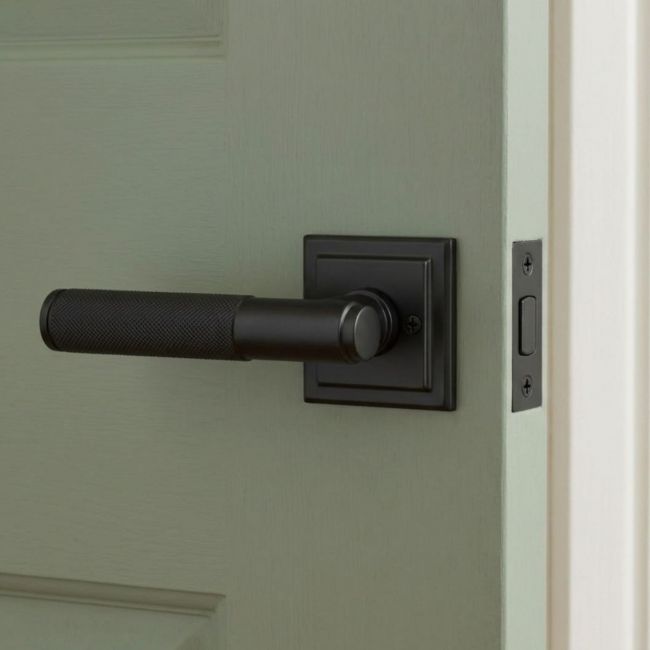 Matte Black Textured Lever Door Handle on Square Rose Front